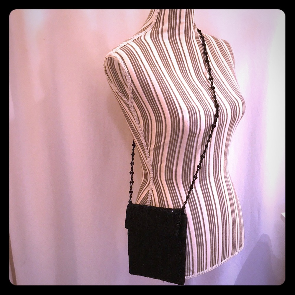 Elan crossbody with black beads. Fancy! EUC